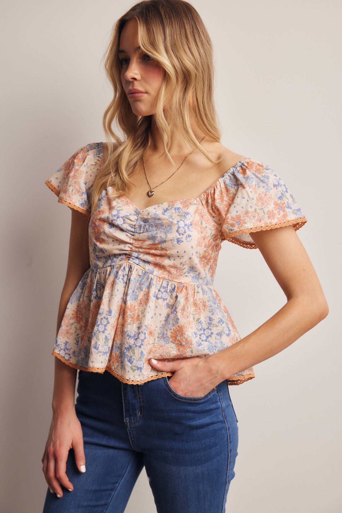 Floral Ruched Peplum Cotton Top
