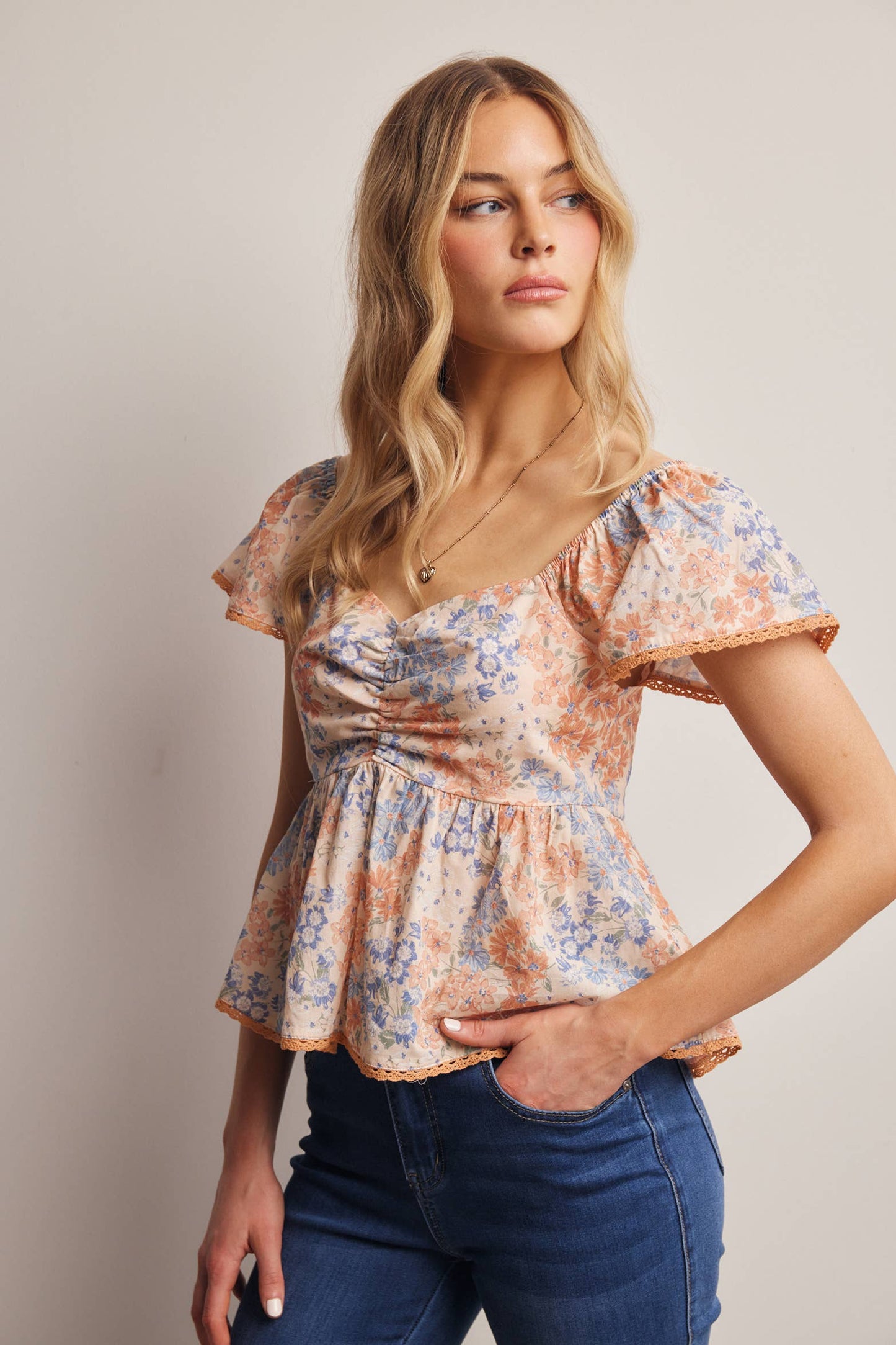 Floral Ruched Peplum Cotton Top