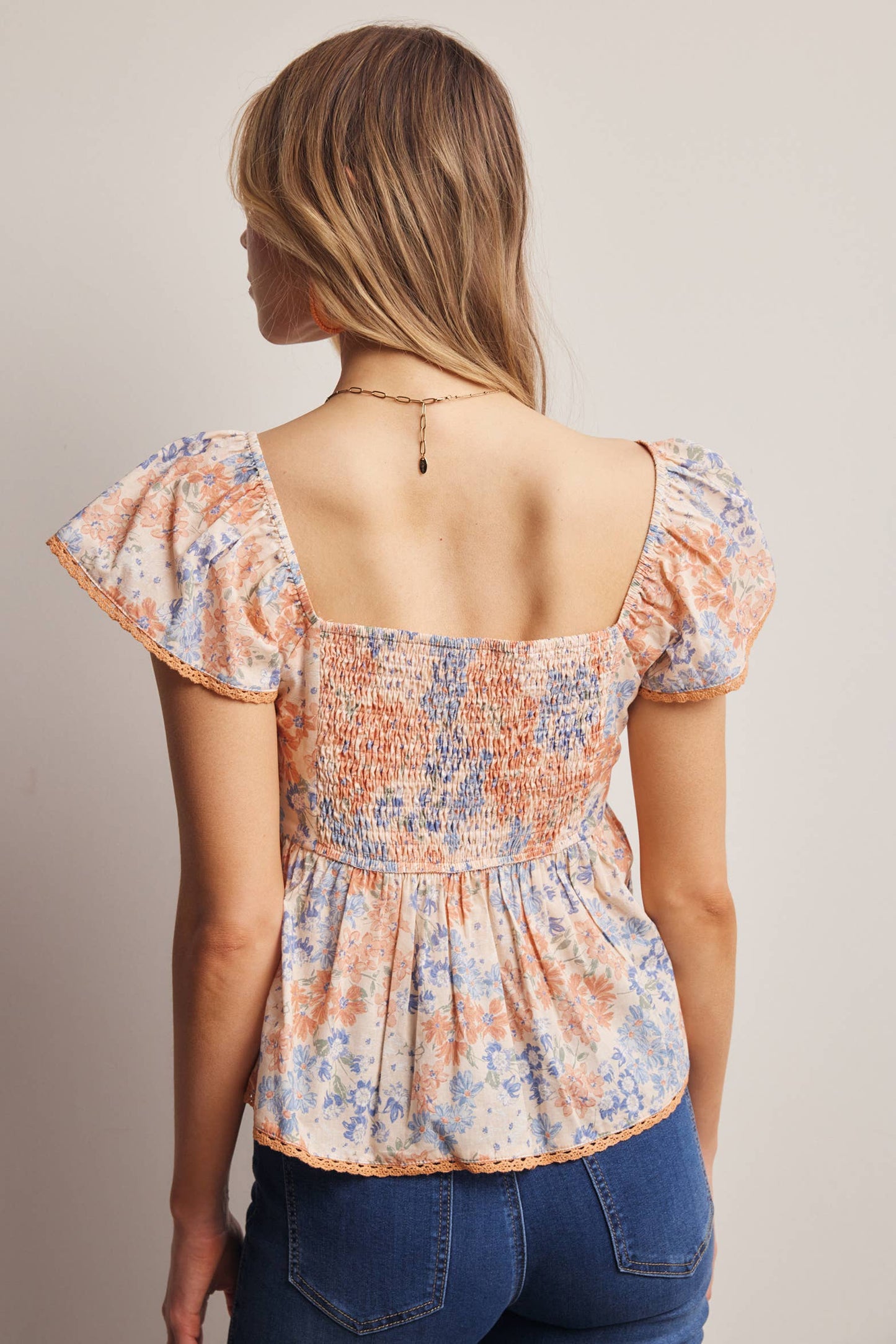 Floral Ruched Peplum Cotton Top
