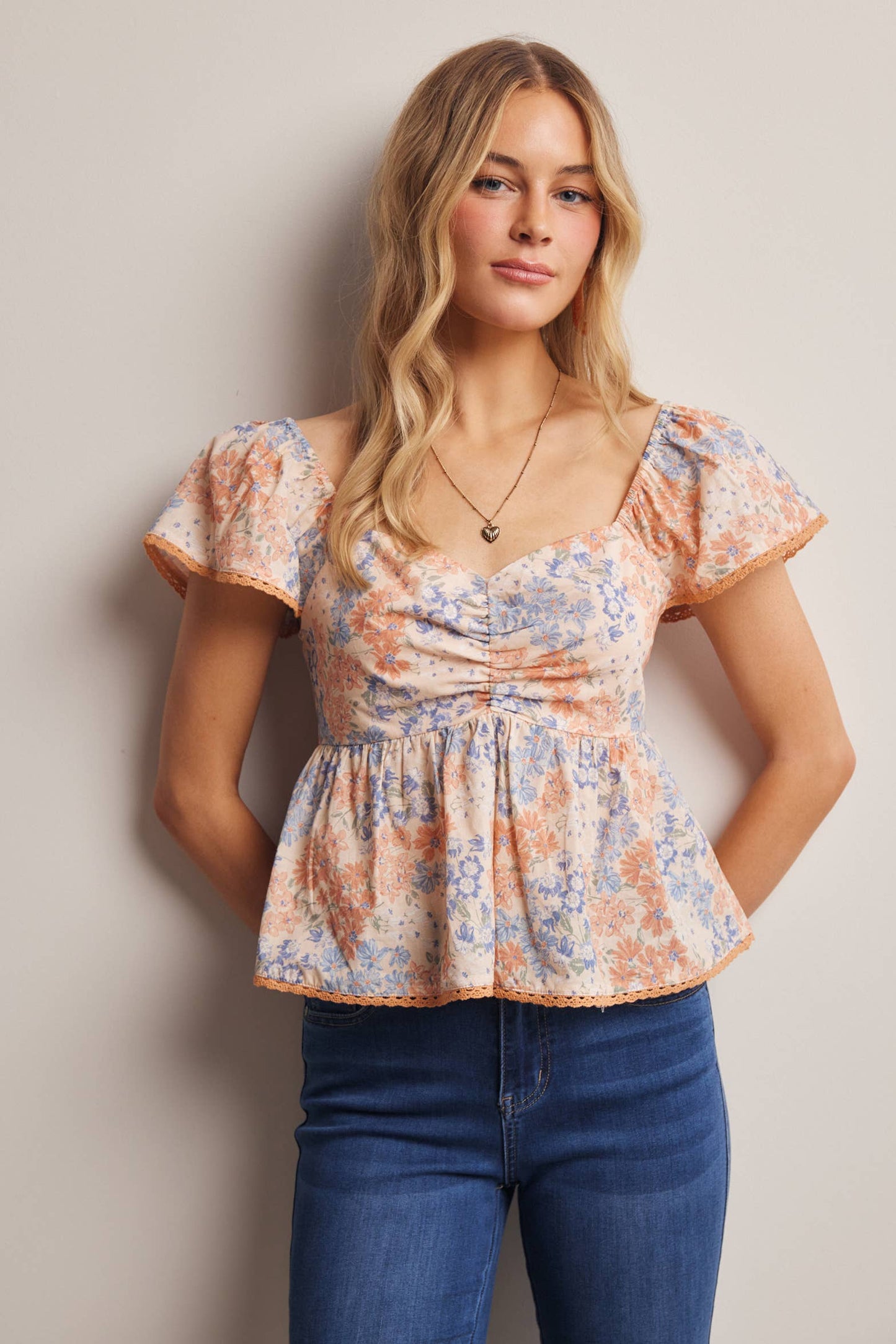Floral Ruched Peplum Cotton Top